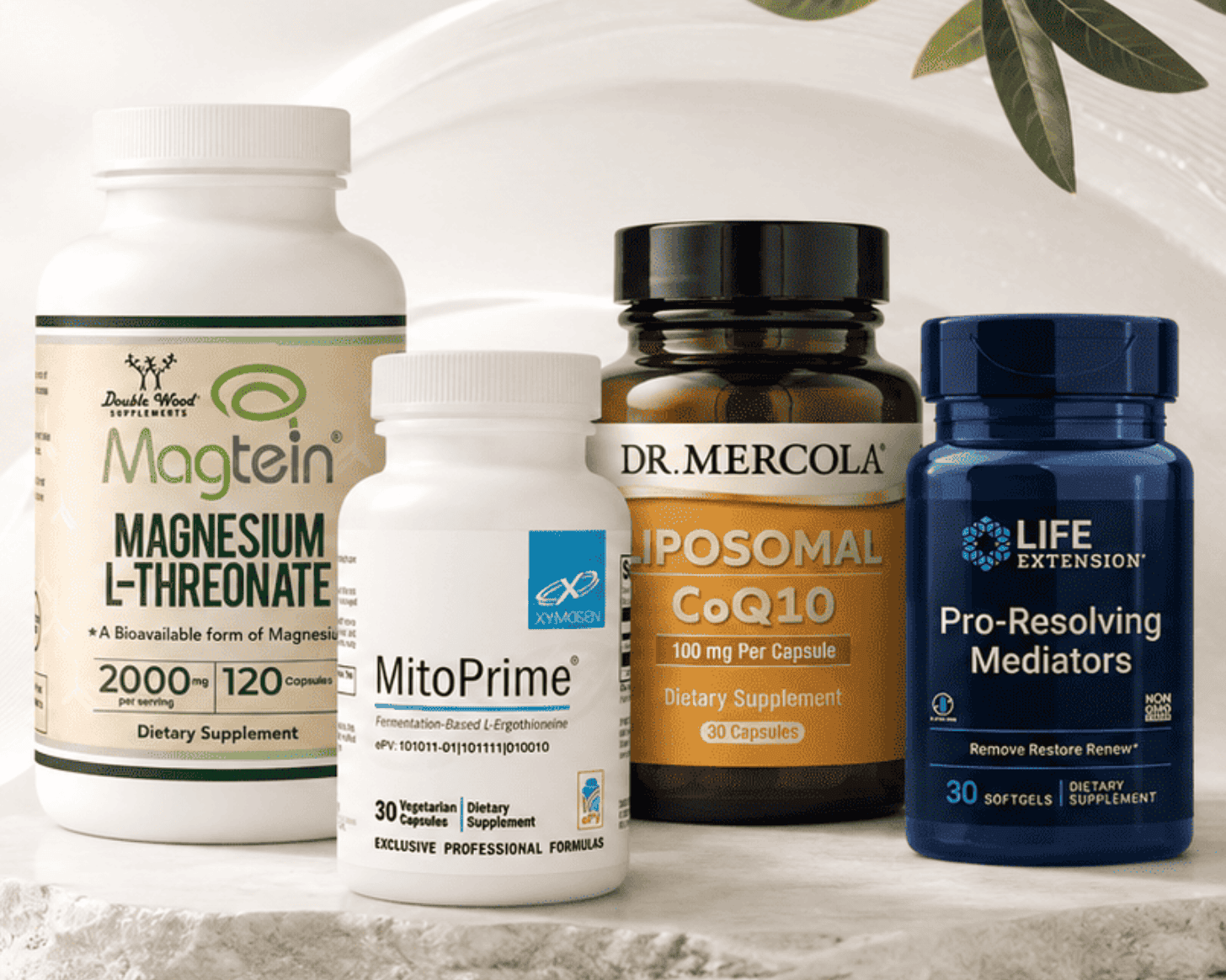 Curated supplement bottles from the Elements collection on stone